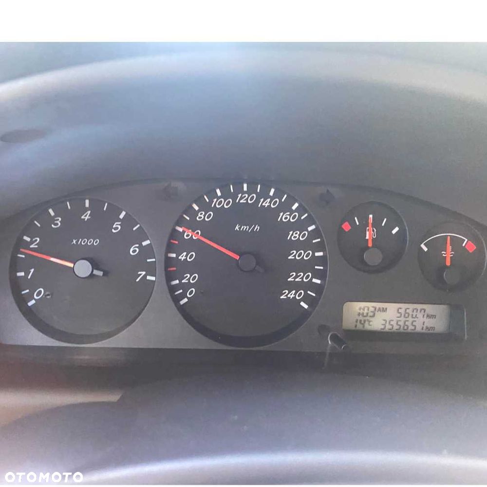 Nissan Almera 2002 photo 4