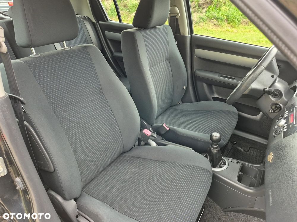 Suzuki Swift 1.3 Club - 11