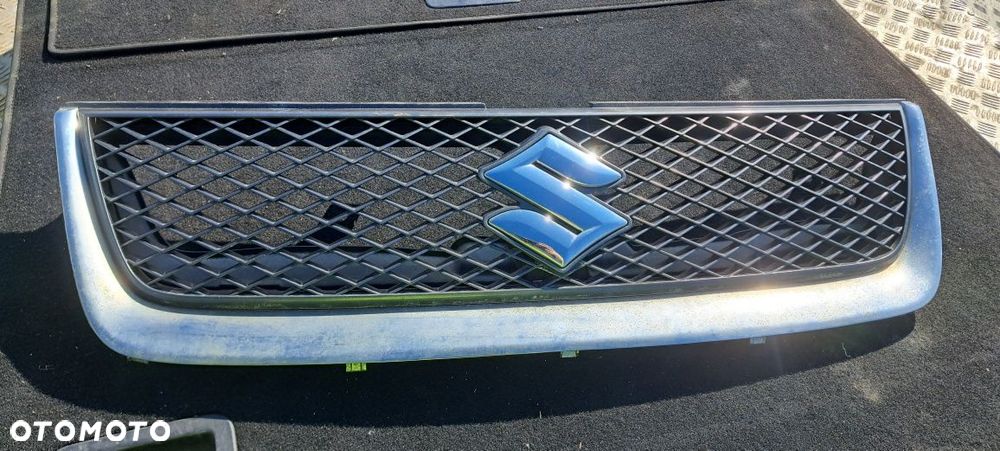 Suzuki Grand Vitara 2 grill atrapa - 1