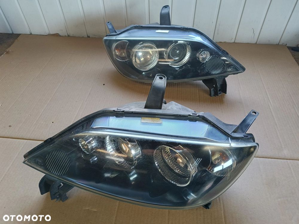 Mazda II 2 lampa przednia przód Europa LIFT stan bdb bez uszkodzeń 2005-07r - 1