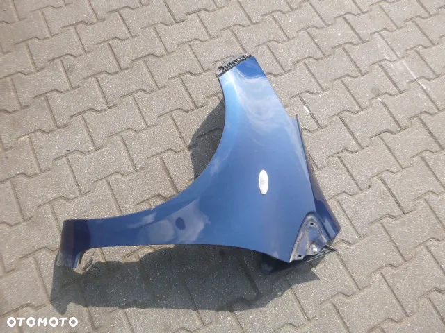 BŁOTNIK LEWY PRZÓD LEWY PRZEDNI TOYOTA YARIS II KOLOR 8P4 05-09 - 2