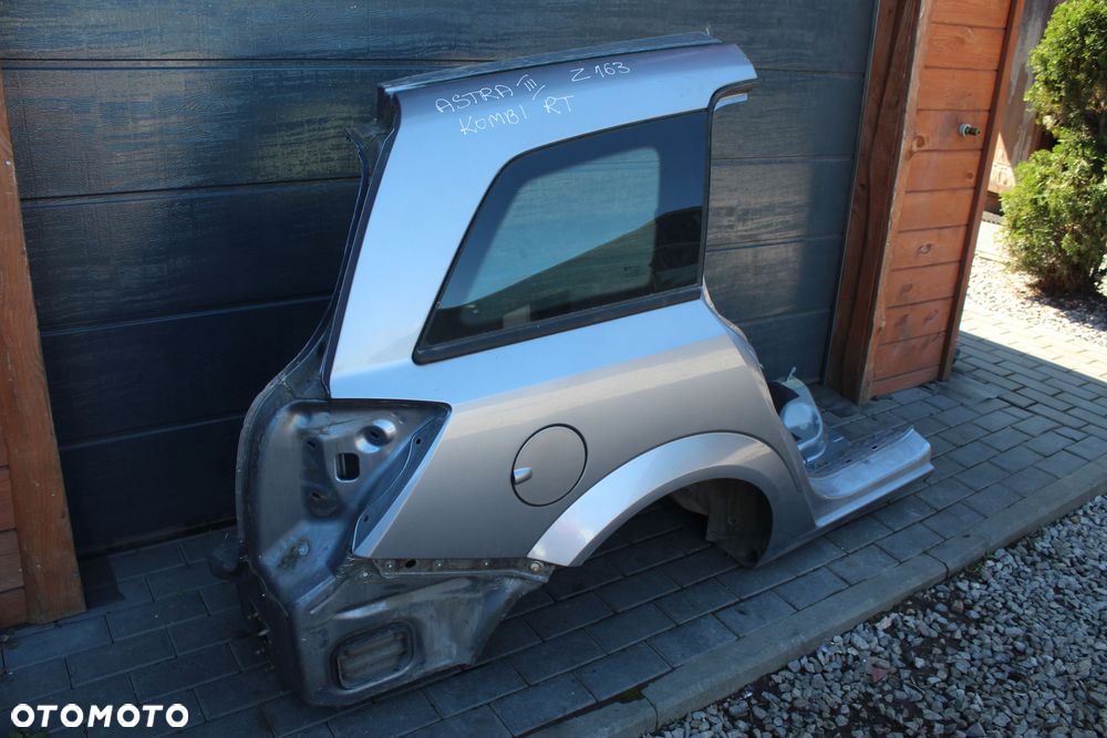 ĆWIARTKA BŁOTNIK PRAWY TYLNY OPEL ASTRA H KOMBI Z163 - 2