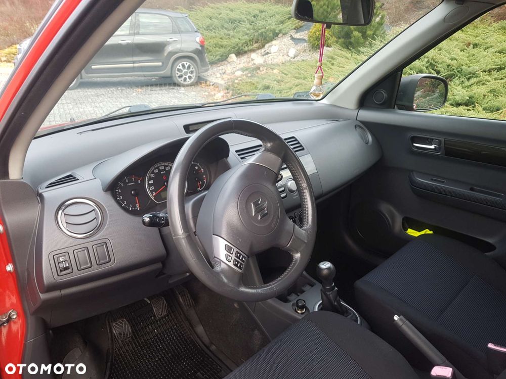Suzuki Swift 1.3 Club - 8