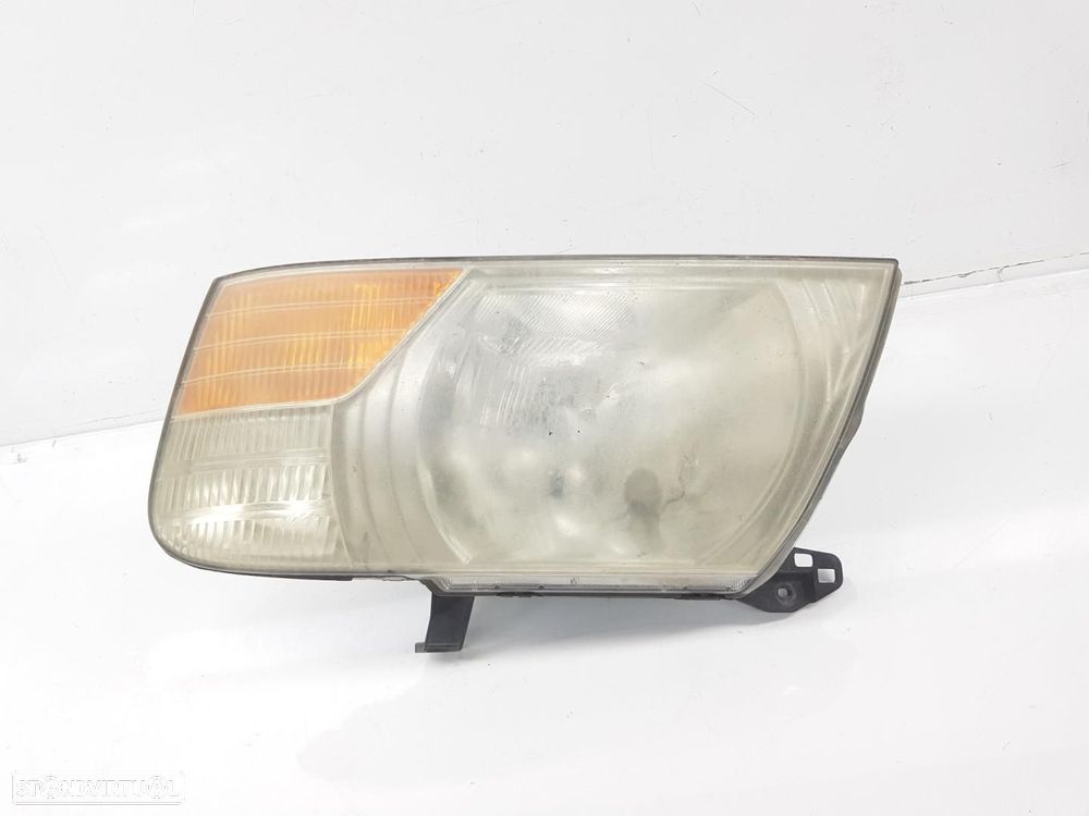 FAROL ESQUERDO MITSUBISHI MONTERO V60V70 - 1