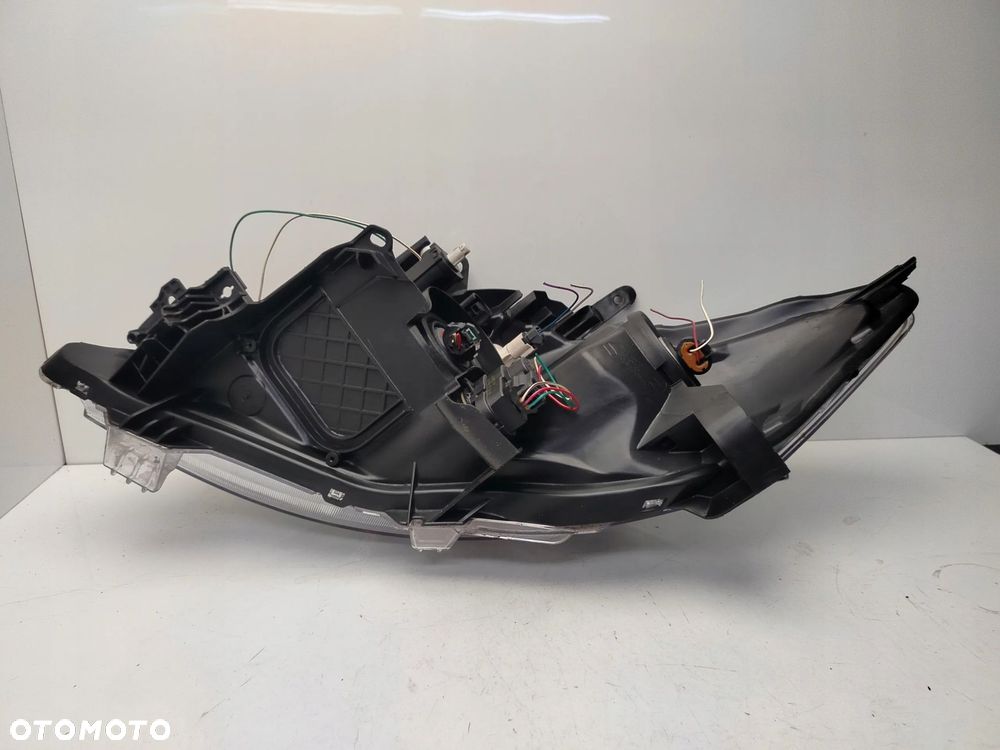 TOYOTA AURIS I LIFT 09R- REFLEKTOR LAMPA PRAWY PRZÓD PRAWA PRZEDNIA - 12