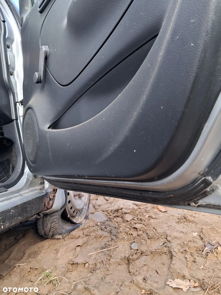 Daihatsu cuore 03 drzwi prawy przod E28 - 6