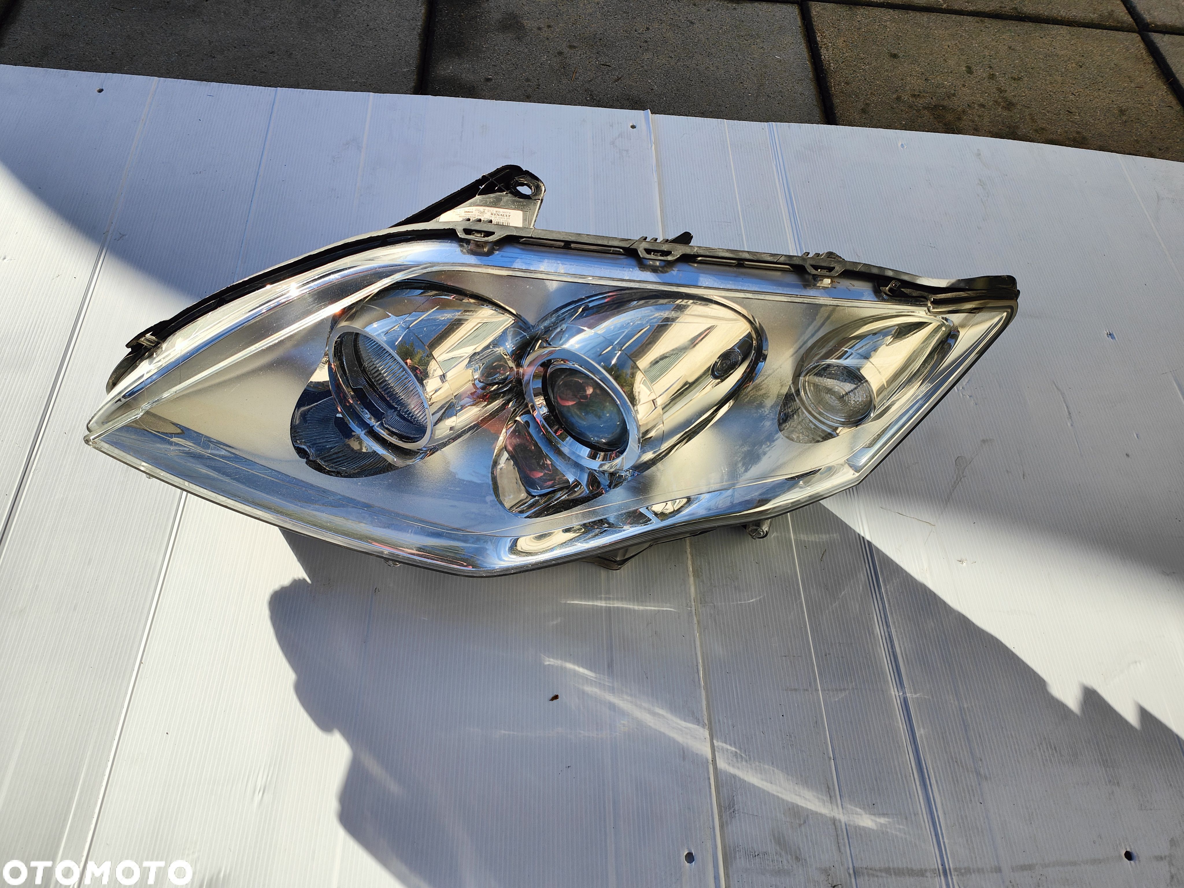RENAULT LAGUNA III LAMPA LEWA PRZÓD 260600033R - 1