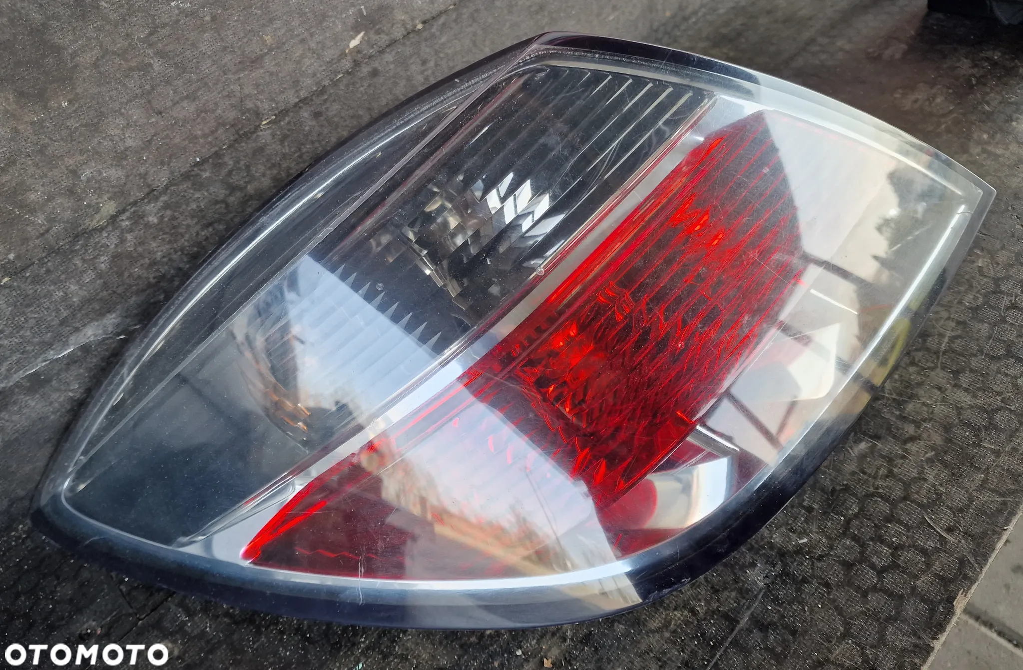 LAMPA LEWA TYŁ 342691834 OPEL ASTRA H III GTC - 4
