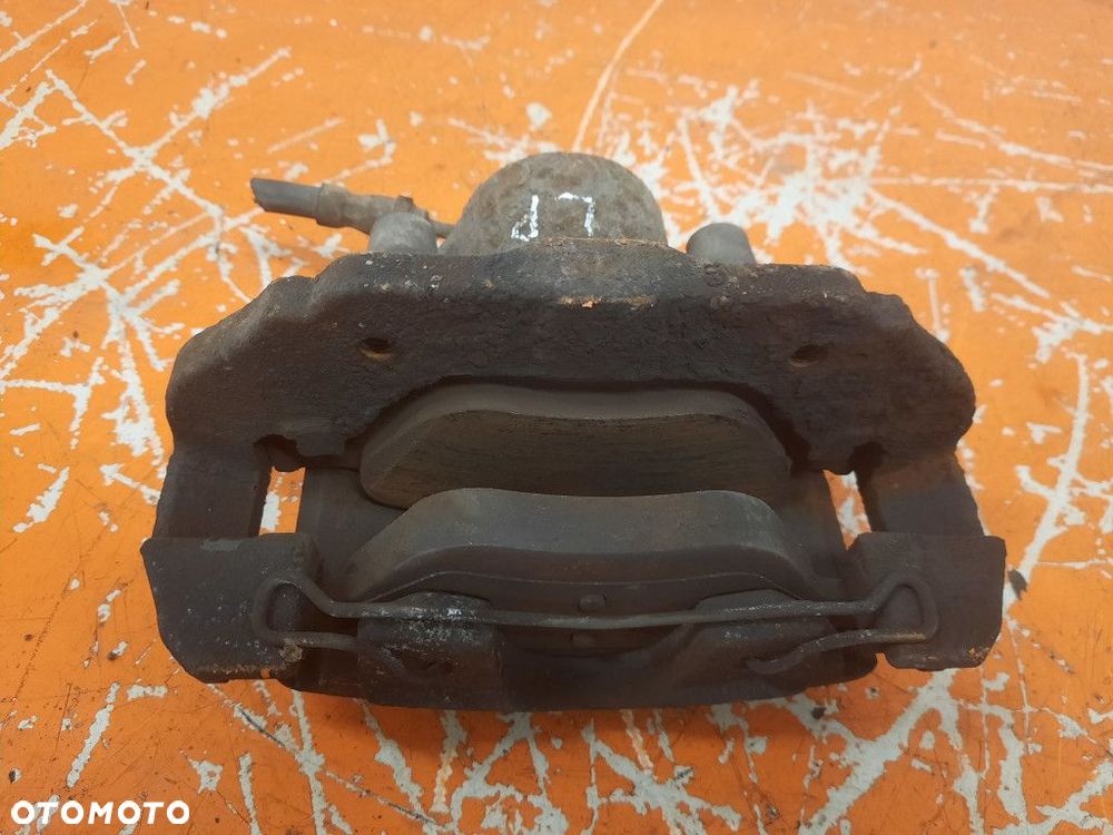 FORD FUSION I 02-05 ZACISK HAMULCOWY PRZÓD LEWY  F6JA - 4