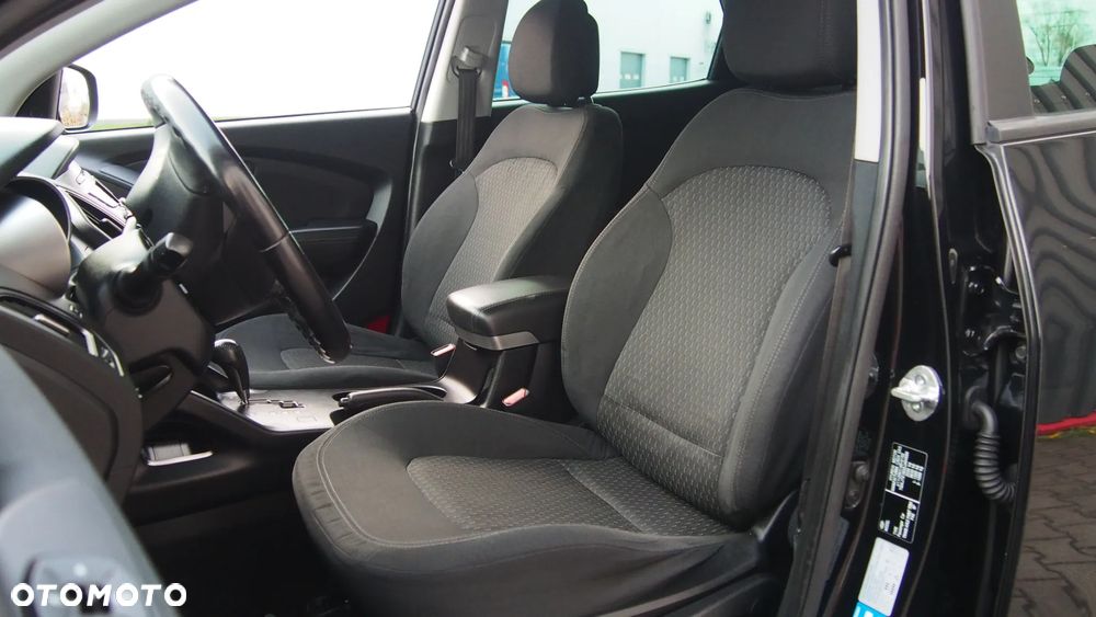Kia Sportage 2.0 CVVT 4WD Spirit - 21