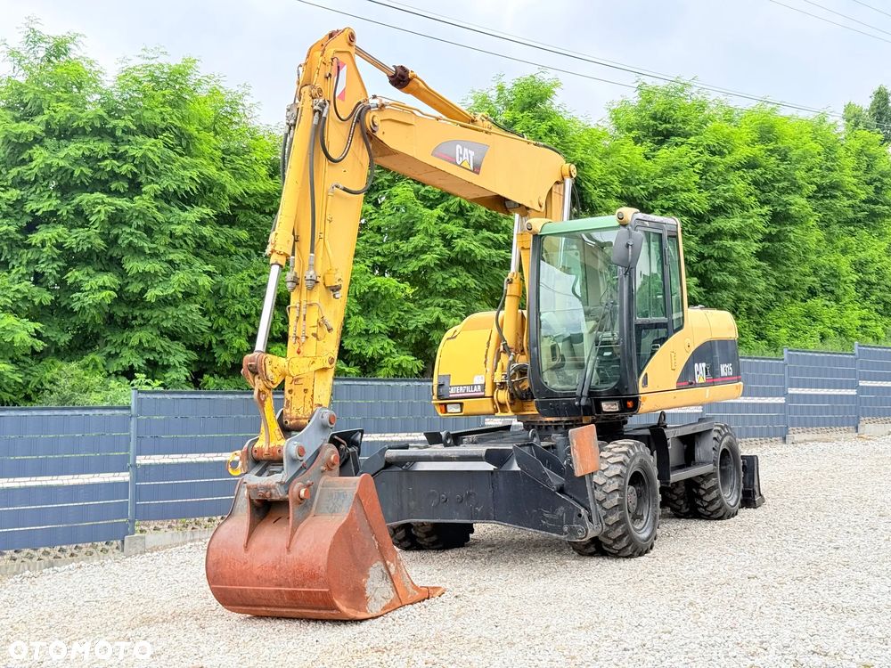 Caterpillar CAT M315C  CATERPILLAR SPROWADZONY  Bardzo Dobry Stan - 2