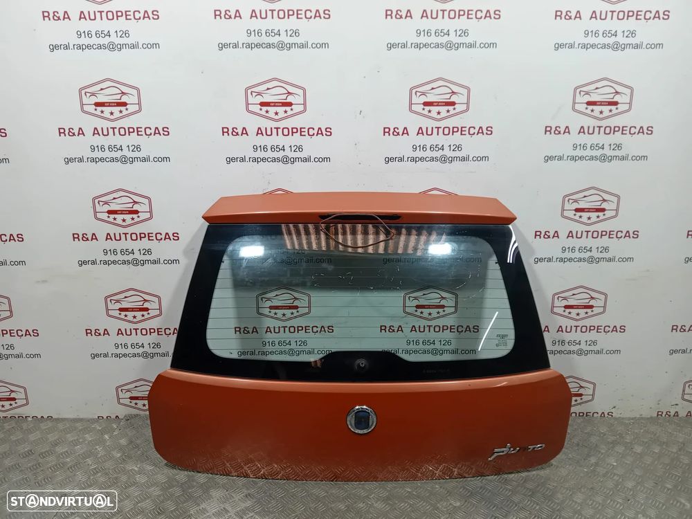 Tampa de Mala Fiat Grand Punto 199 Original - 4