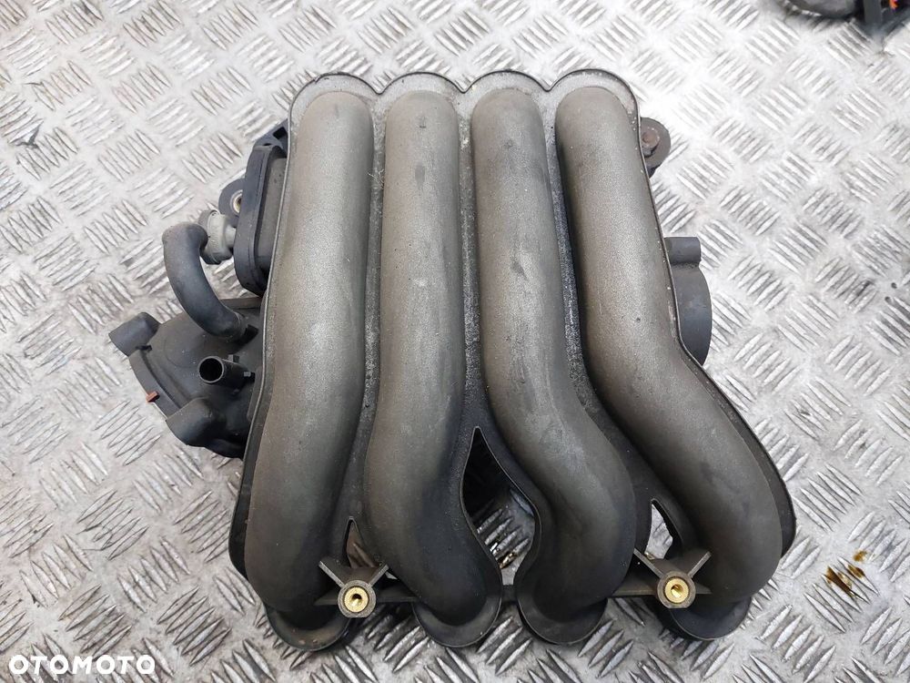KOLEKTOR SSĄCY VW PASSAT B5 FL 2.0 8V 06B133210AS - 1