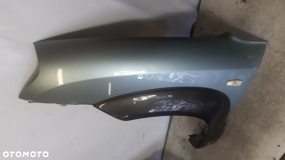 * BŁOTNIK PRZEDNI PRZÓD LEWY HYUNDAI TUSCON I OLIWKOWY KOLOR BU - 2