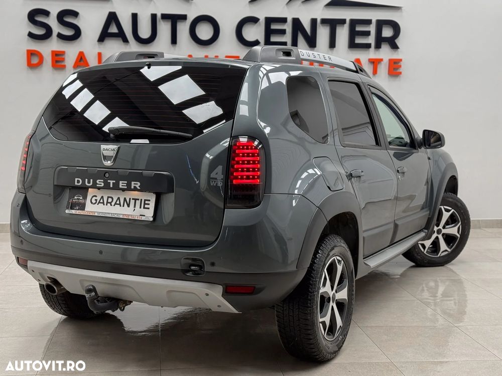 Dacia Duster 1.6 SCe 4WD SL Orange - 14