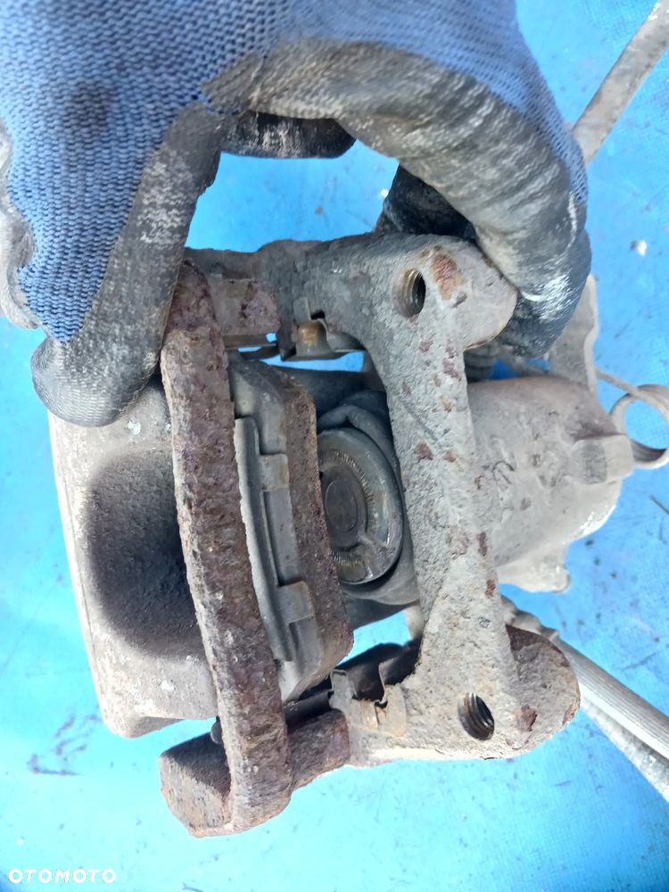 Zacisk tył Opel Zafira B Meriva B Astra H prawy lewy TRW Tarcze - 4