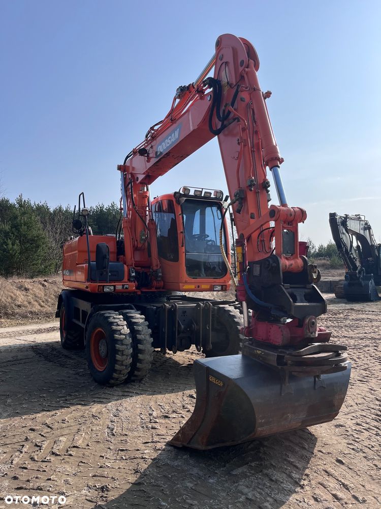 Doosan DX140W - 11