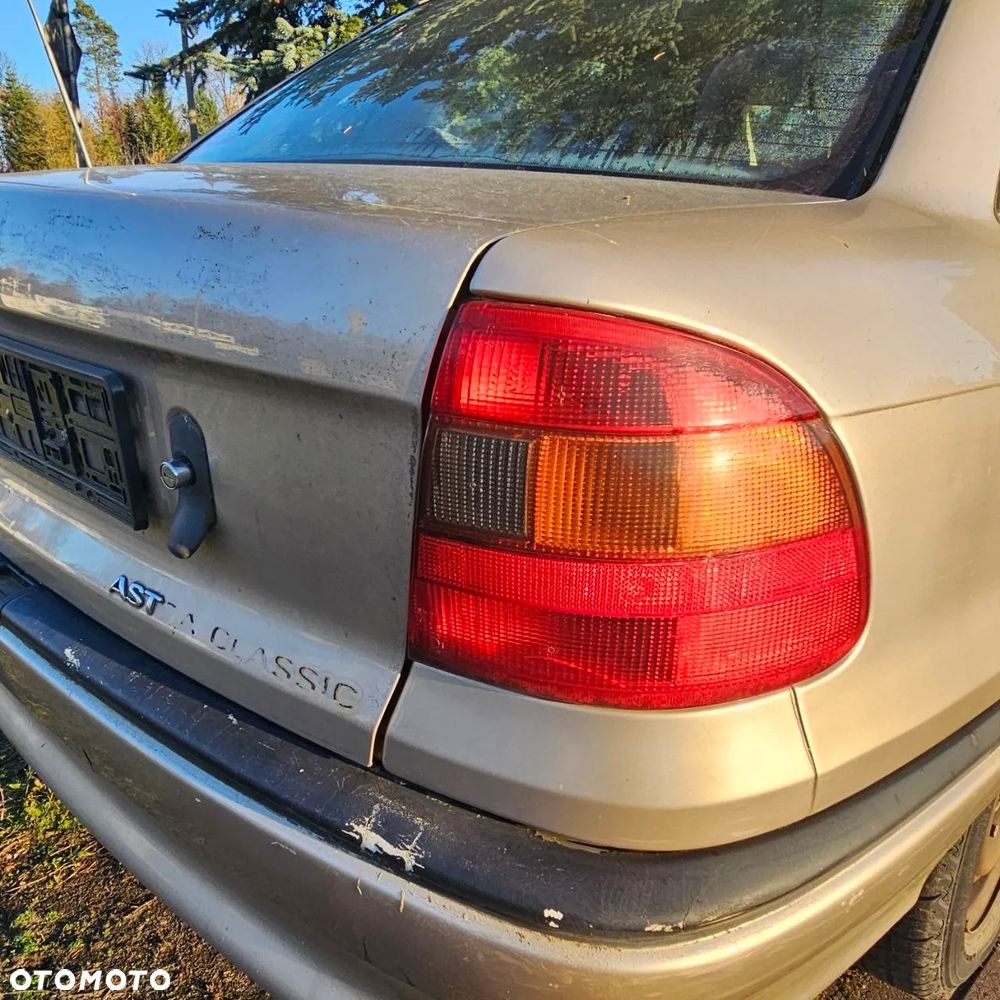 Opel Astra Classic F 1,4 B  (Z489) pojazd na części: maska, zderzak, drzwi, szyby, lusterka, chłodnica - 21