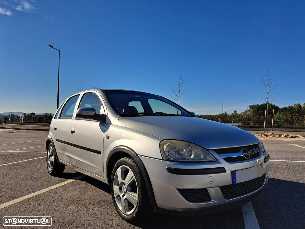 Opel Corsa 1.2 Twinport Cosmo - 1