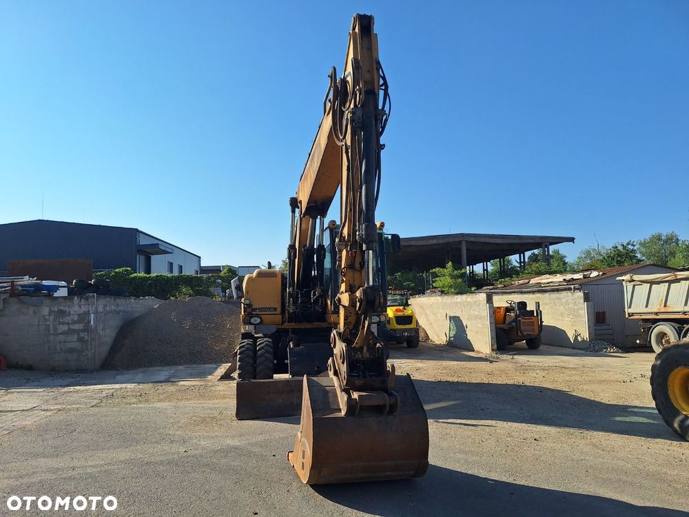 Caterpillar M315D 4X4 - 2
