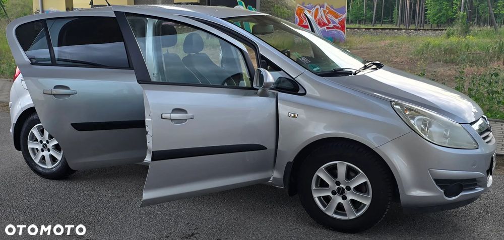 Opel Corsa 1.4 16V Cosmo - 11