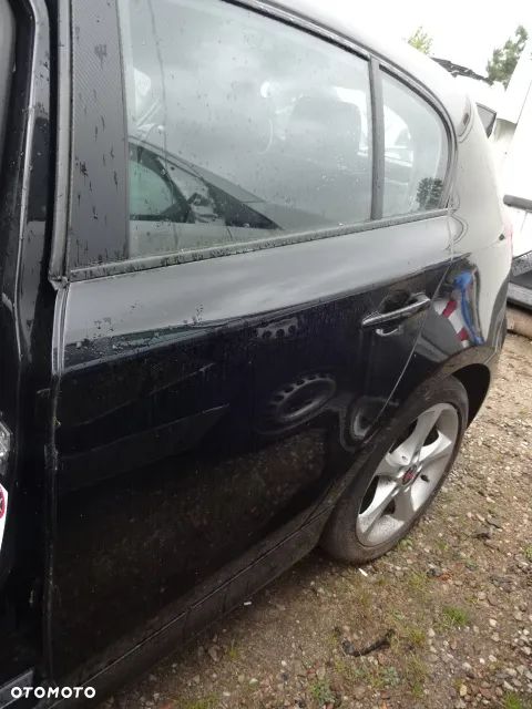 Kompletne tylne lewe drzwi BMW E87 668/9 - 1
