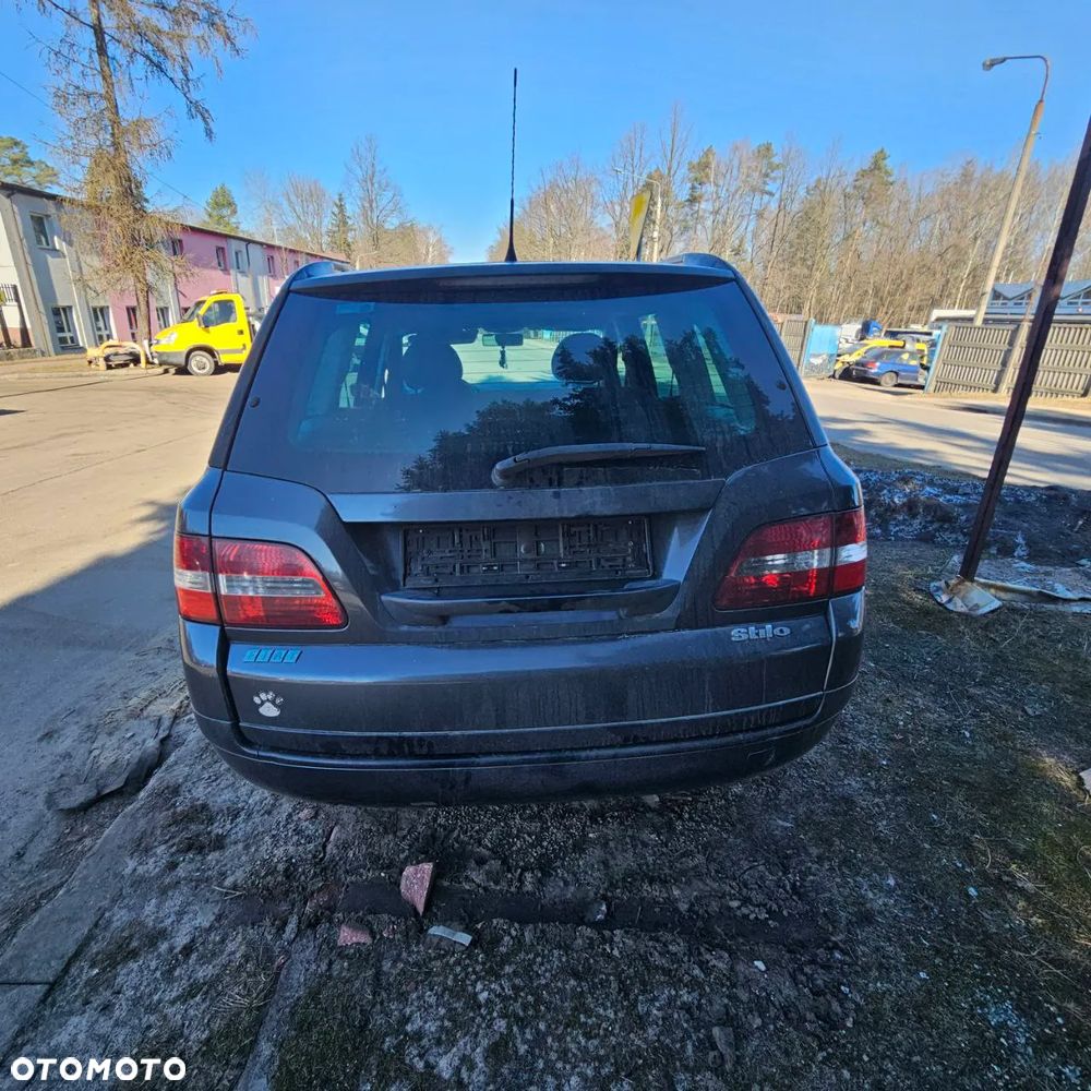 Fiat Stilo 1,6 B 76 kW / 103 KM (2003 kombi) (kod lak: 675) pojazd na części: maska, zderzak, drzwi, szyby, lusterka, chłodnica ... - 21