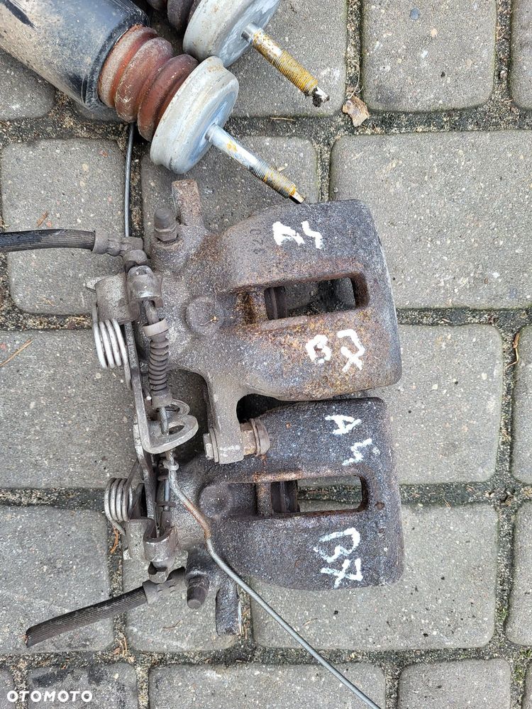 Zacisk tylny audi a4 b7