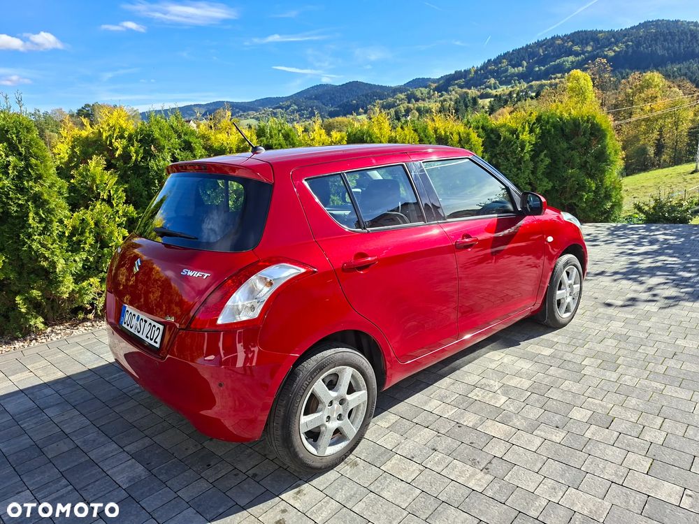 Suzuki Swift 1.2 4x4 Club - 8