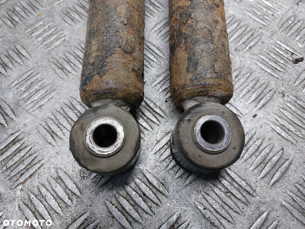 AMORTYZATORY + SPRĘŻYNY TYŁ KOMPLET RENAULT CLIO III LIFT - 2