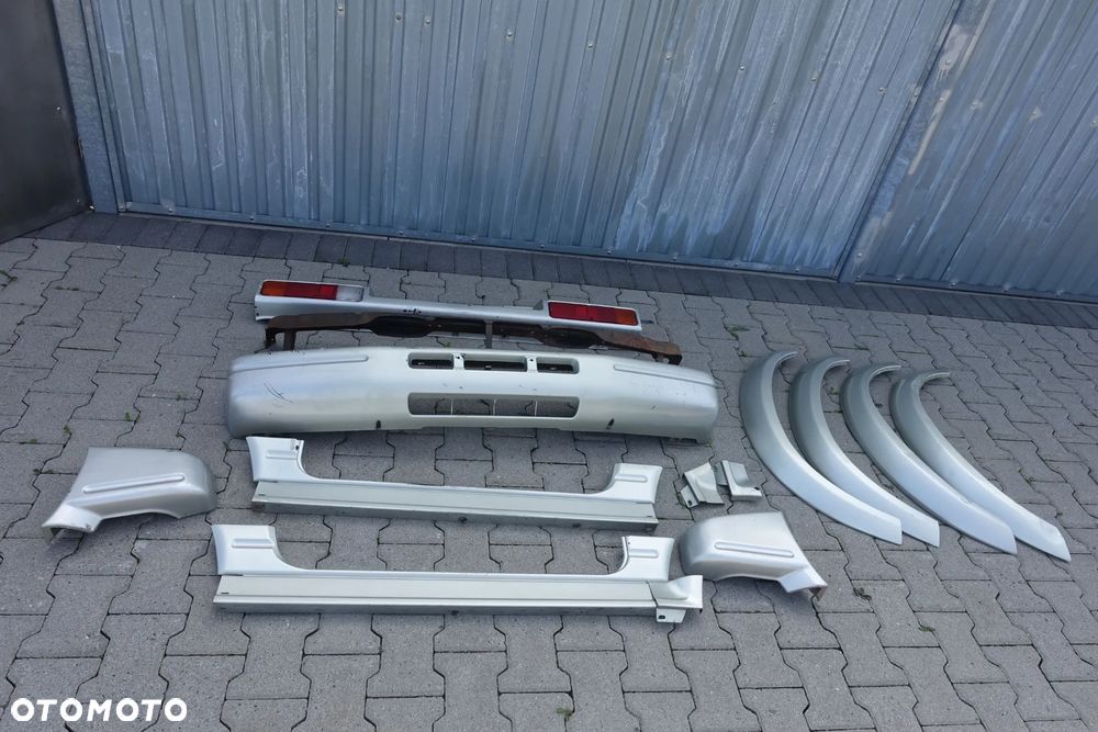 ZDERZAK PRZEDNI TYLNY LISTWY NADKOLI SUZUKI SAMURAI - 1