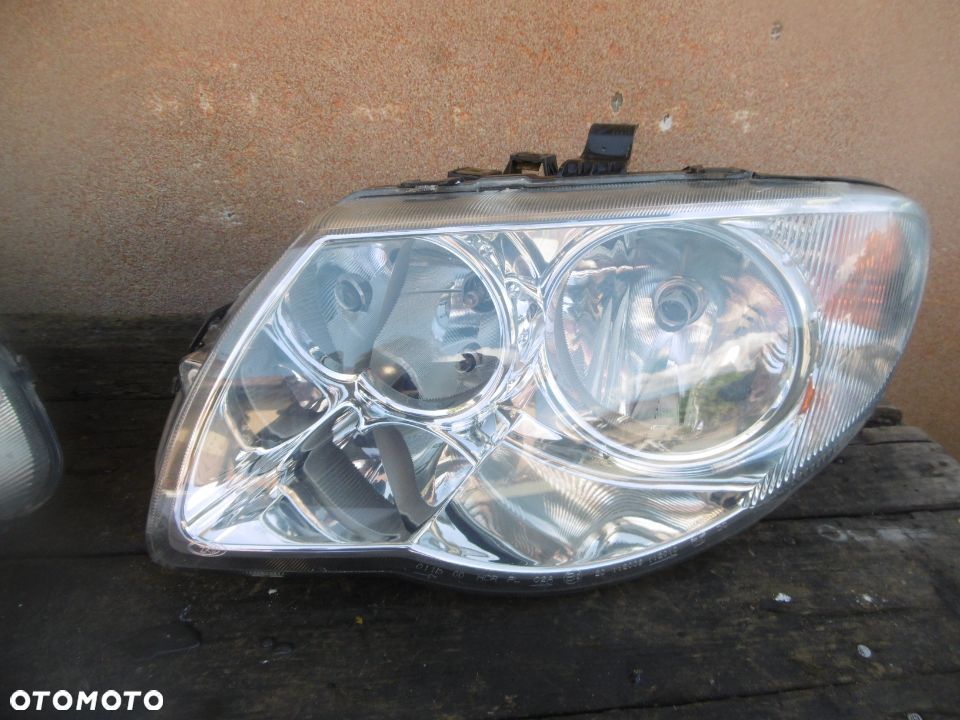 Lampa lewa chrysler voyager zkw lift europa - 1