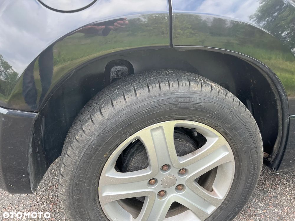 Suzuki Grand Vitara 2.0 - 10