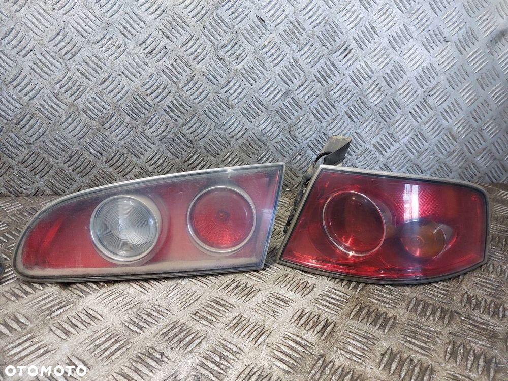 LAMPA LEWY TYŁ + PRAWY TYŁ W KLAPĘ W BŁOTNIK KOMPLET SEAT IBIZA III - 3