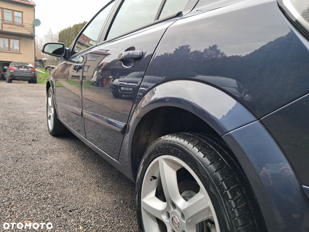 Opel Astra 1.8 Sport - 23