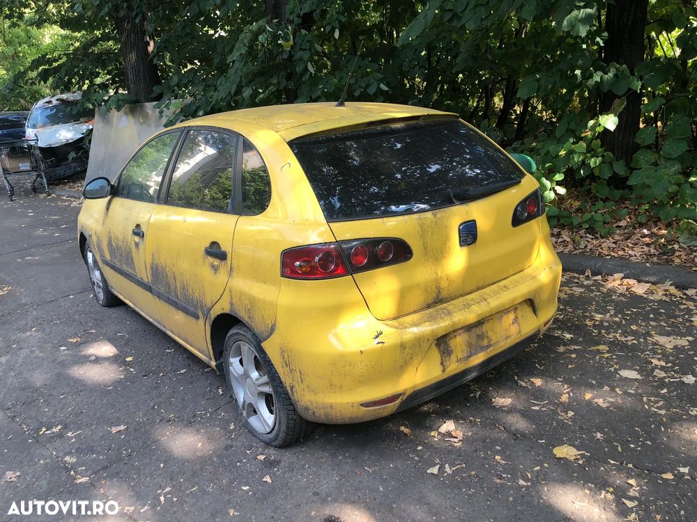 Dezmembrez Seat Ibiza 2006 galben 1,2 benzina - 11