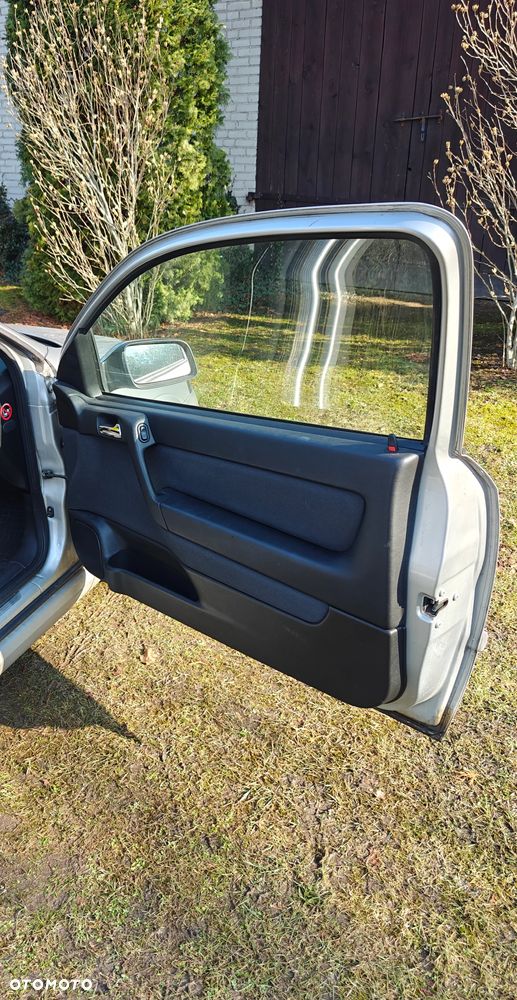 Opel Astra 1.8 Sport - 13