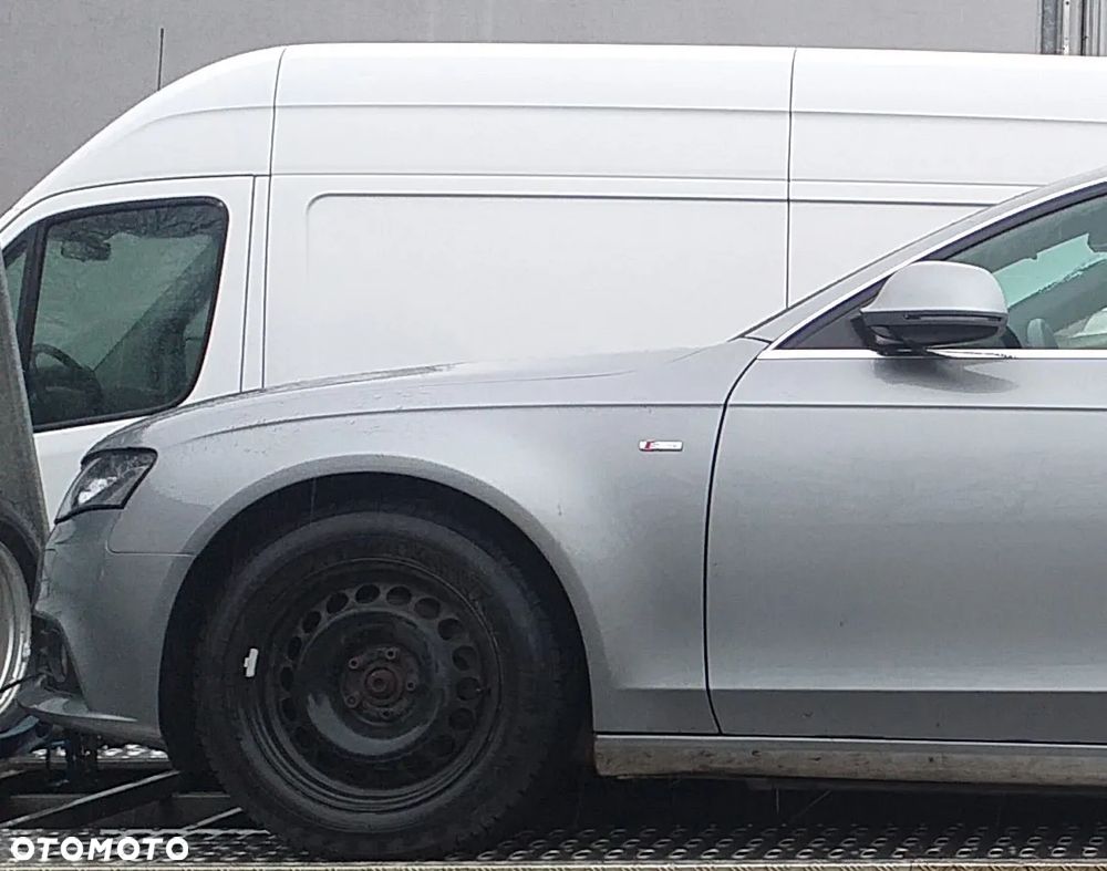 Błotnik Lewy Audi A4 B8 kombi lak. LY7G - 1