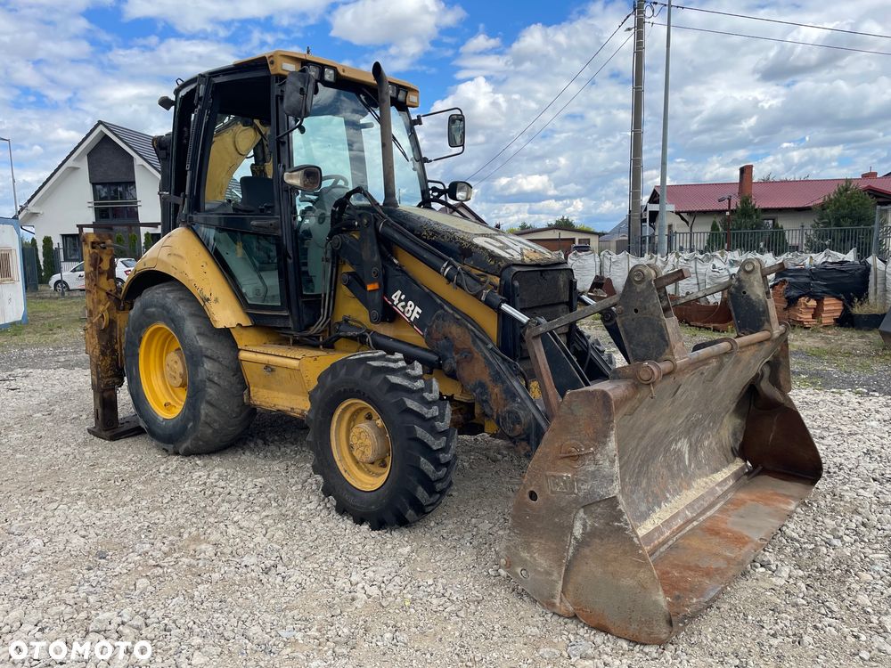 Caterpillar 428E - 8