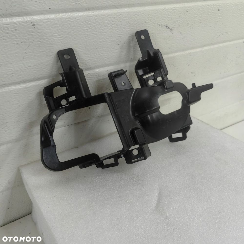 Mocowanie halogenu lewe Nissan Qashqai j11 lift 26915-HV01A - 2