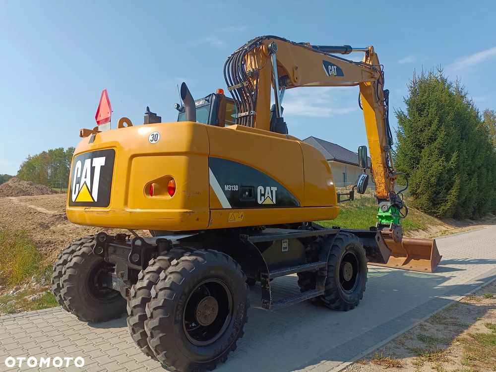 Caterpillar M313D - 15