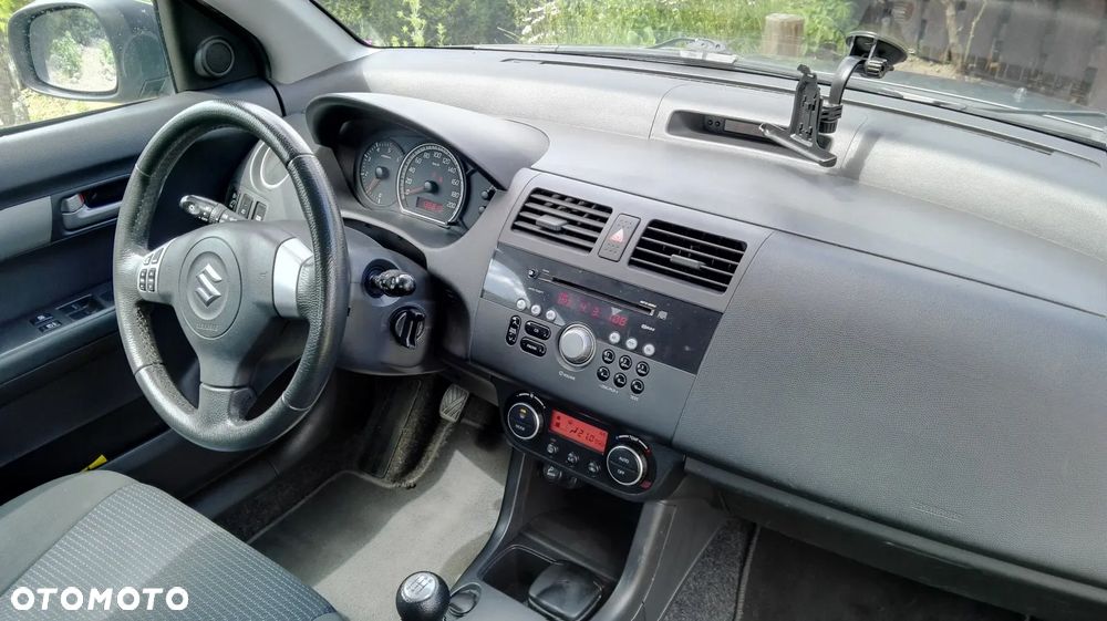 Suzuki Swift 1.3 DDiS Comfort - 9