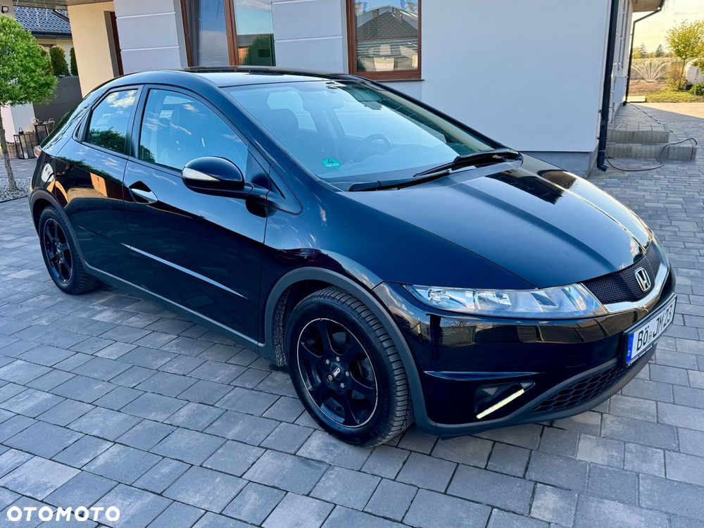 Honda Civic 1.4i-DSi Comfort - 1