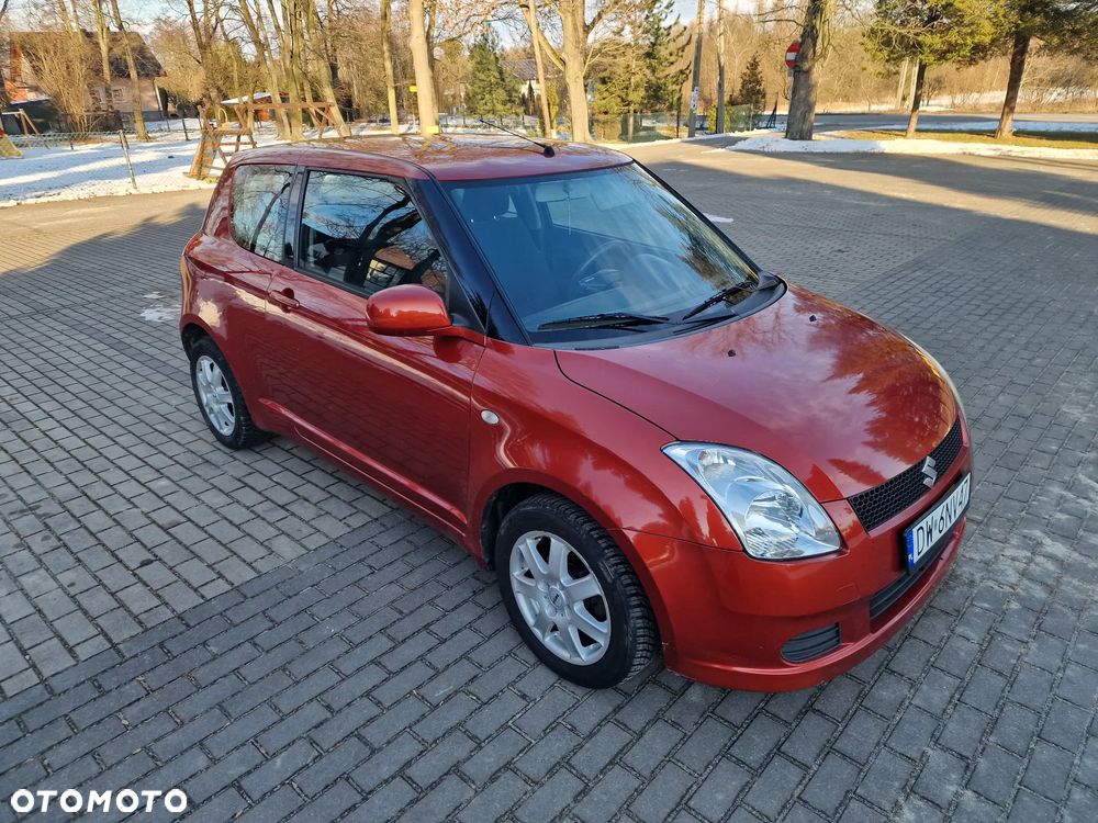 Suzuki Swift 1.3 Club - 4