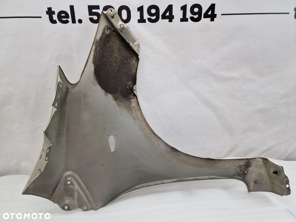 TOYOTA YARIS II LIFT 09-11 LEWY ŁADNY BŁOTNIK PRZEDNI PRZÓD , BEŻOWY METALIK , NR AUKCJI BŁ57 - 15