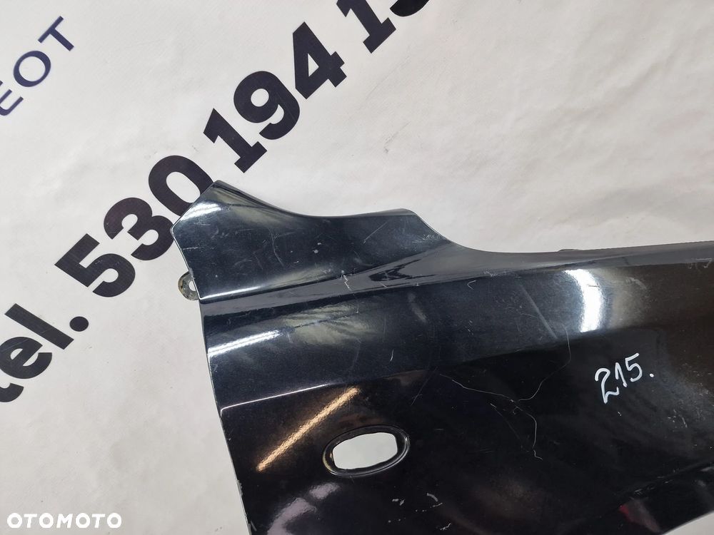 MAZDA 2 03-07 PRAWY BŁOTNIK PRZEDNI PRZÓD , NR AUKCJI BŁ215 - 10