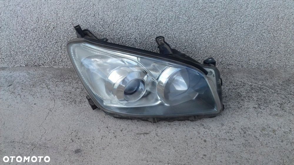TOYOTA RAV 4 LIFT 09- LAMPA PRZEDNIA PRAWA CZARNA - 1