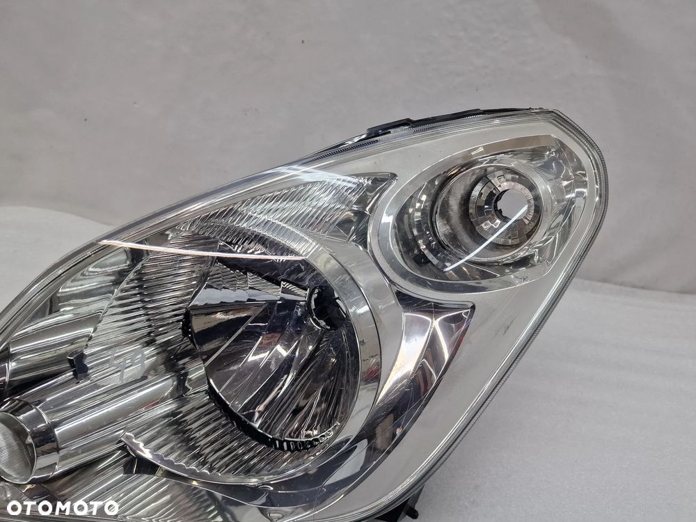 SUZUKI SPLASH LIFT 11- LEWA LAMPA PRZEDNIA PRZÓD , NR 35300-51K20 / 90030690 , NR AUKCJI LPP49 - 8