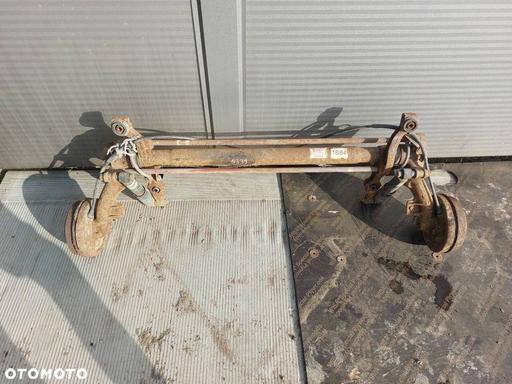 BELKA OŚ ZAWIESZENIA TYŁ BĘBNY PEUGEOT 106 I LIFT 96-03r 4-SZPILKI - 1