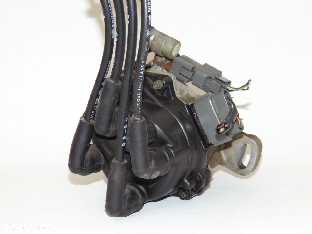 ORYGINAŁ aparat zapłonowy 22100-99B04 Nissan Micra K11 1.0 1.3 - 6